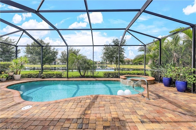 view of pool with an in ground hot tub, a water view, a patio area, and a lanai