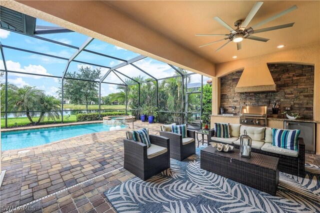 exterior space featuring a lanai, exterior kitchen, a grill, ceiling fan, and an outdoor hangout area