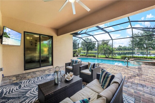 sunroom with ceiling fan and vaulted ceiling