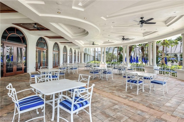 view of patio / terrace featuring ceiling fan and french doors