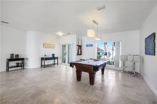 game room with french doors and pool table