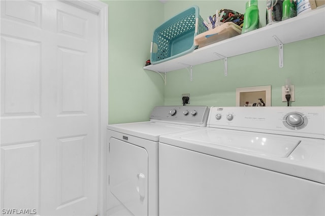 laundry area with washer and clothes dryer