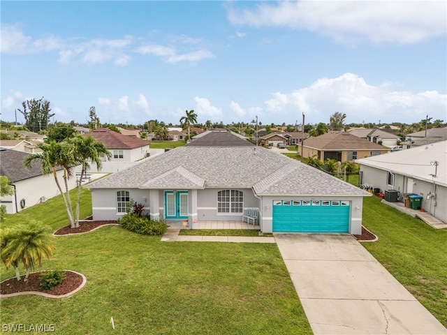 ranch-style home with central AC unit, a front yard, and a garage