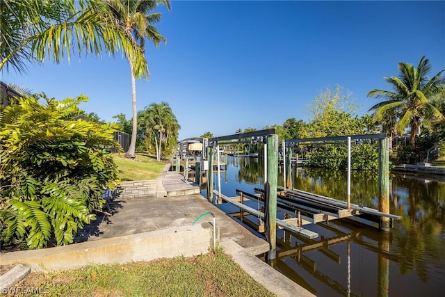 dock area with a water view