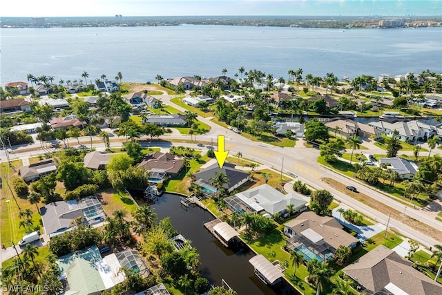 drone / aerial view with a water view