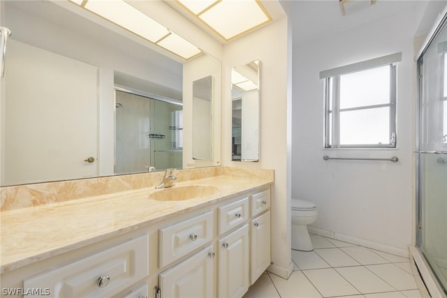 bathroom with vanity, a baseboard heating unit, tile patterned floors, toilet, and a shower with shower door