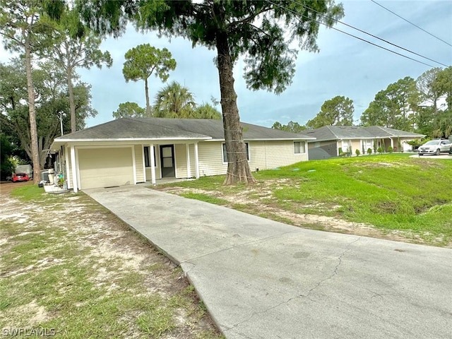 single story home featuring a garage and a front lawn