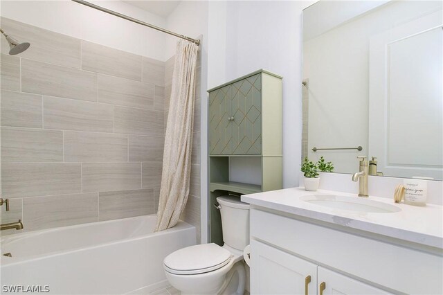 full bathroom featuring vanity, shower / bath combination with curtain, and toilet