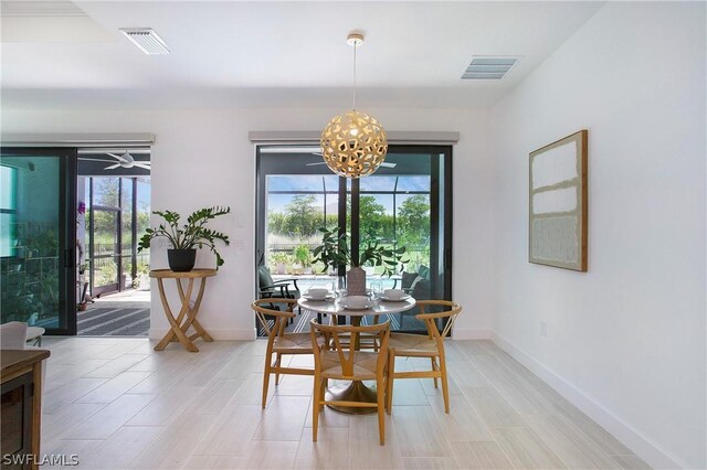 dining area featuring a chandelier