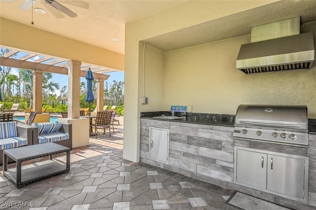 view of patio featuring area for grilling, a pergola, and sink