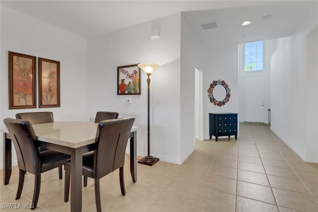 14573 Abaco Lakes Dr Unit 102, Fort Myers, FL 33908 - dining space featuring baseboards and light tile patterned floors