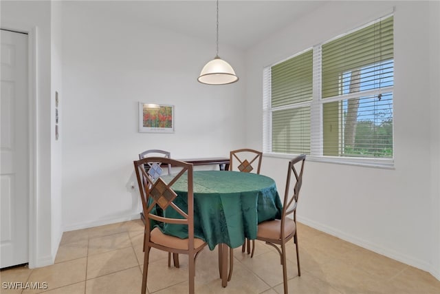 14573 Abaco Lakes Dr Unit 102, Fort Myers, FL 33908 - dining room with baseboards and tile patterned flooring