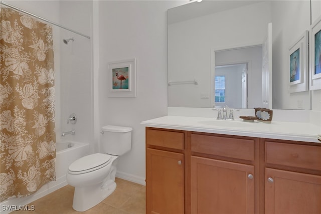 14573 Abaco Lakes Dr Unit 102, Fort Myers, FL 33908 - bathroom featuring baseboards, toilet, tile patterned floors, vanity, and shower / bath combo with shower curtain