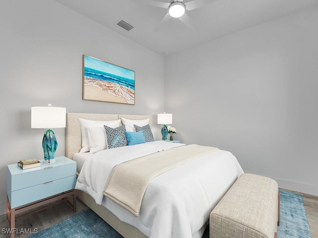 bedroom featuring wood-type flooring and ceiling fan