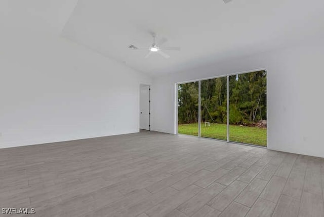 empty room with light hardwood / wood-style flooring and ceiling fan