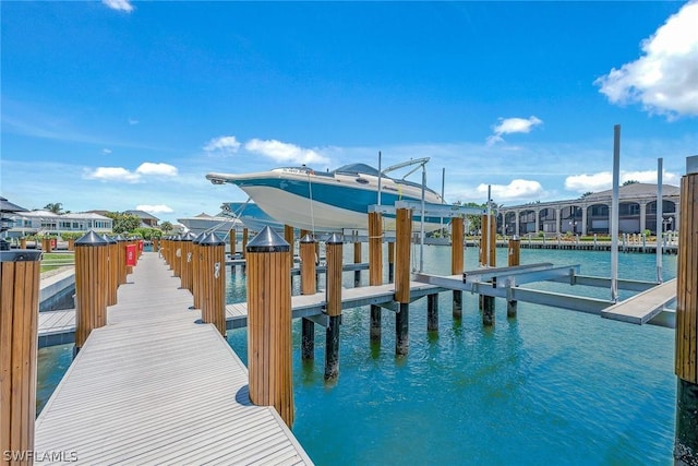 dock area with a water view