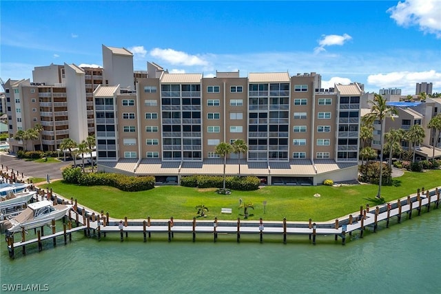 view of building exterior with a water view