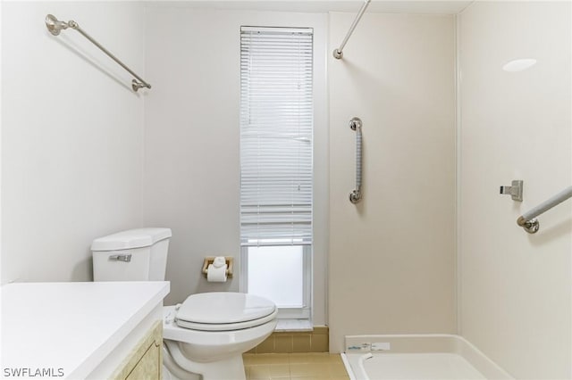 251 Palm Dr Unit 251-2, Naples, FL 34112 - full bath featuring toilet, vanity, a shower, and tile patterned flooring