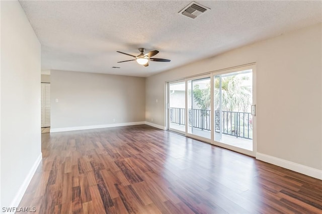 251 Palm Dr Unit 251-2, Naples, FL 34112 - unfurnished room featuring ceiling fan, wood finished floors, baseboards, and a textured ceiling