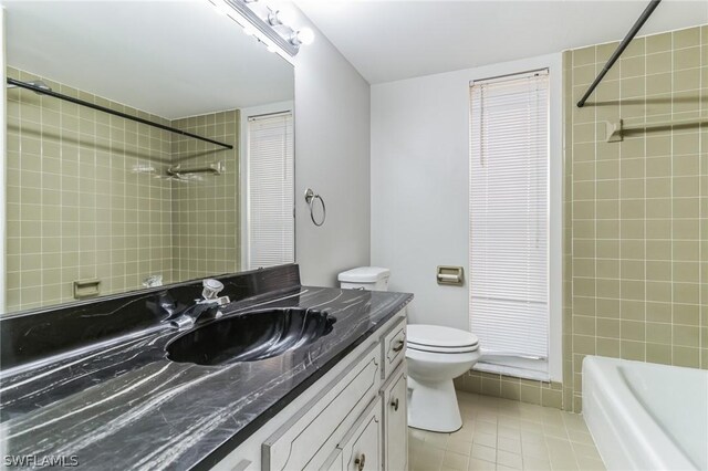 251 Palm Dr Unit 251-2, Naples, FL 34112 - full bathroom with vanity, tile patterned floors, toilet, and tub / shower combination