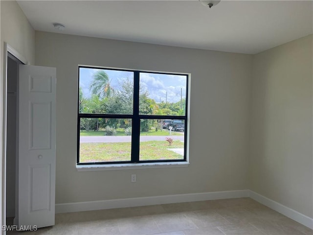 view of tiled spare room