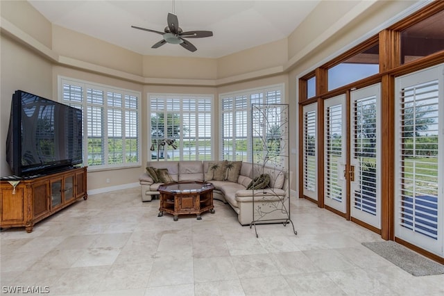 living room featuring ceiling fan