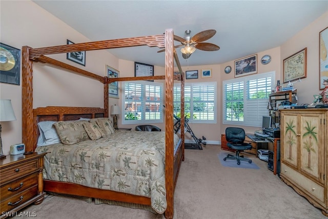 bedroom featuring ceiling fan and light carpet