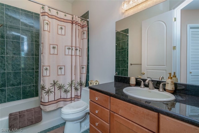 full bathroom featuring tile patterned floors, vanity, shower / bath combination with curtain, and toilet