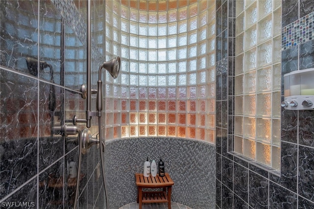 interior space featuring tiled shower