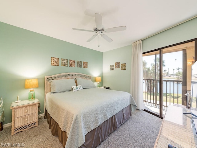 12621 Kelly Sands Way Unit 317, Fort Myers, FL 33908 - bedroom with access to outside, carpet, a water view, and a ceiling fan
