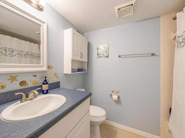 12621 Kelly Sands Way Unit 317, Fort Myers, FL 33908 - bathroom featuring toilet, vanity, a shower with curtain, and tile patterned flooring