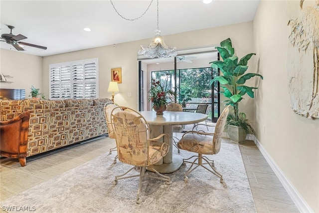 dining room featuring ceiling fan