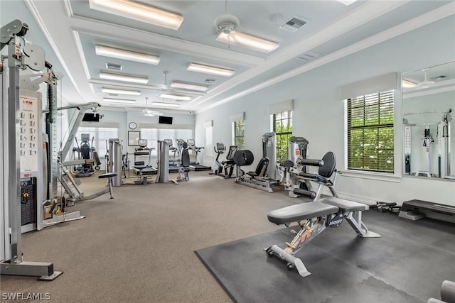 exercise room with ceiling fan