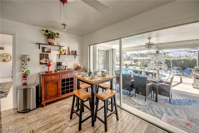 dining area with ceiling fan