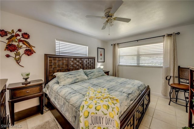 bedroom featuring light tile patterned floors and ceiling fan