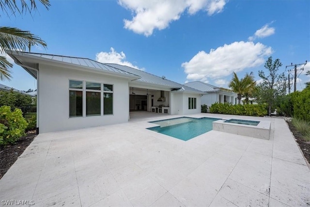 23517 Coconut Landing Dr, Estero, FL 34134 - view of swimming pool with a patio and a pool with connected hot tub