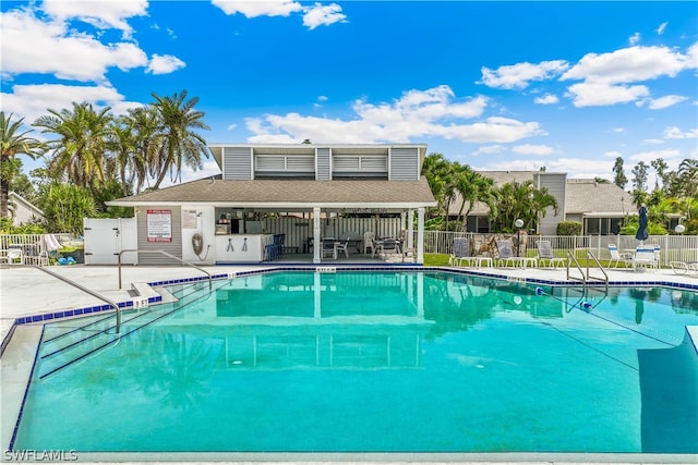 view of swimming pool featuring a patio area