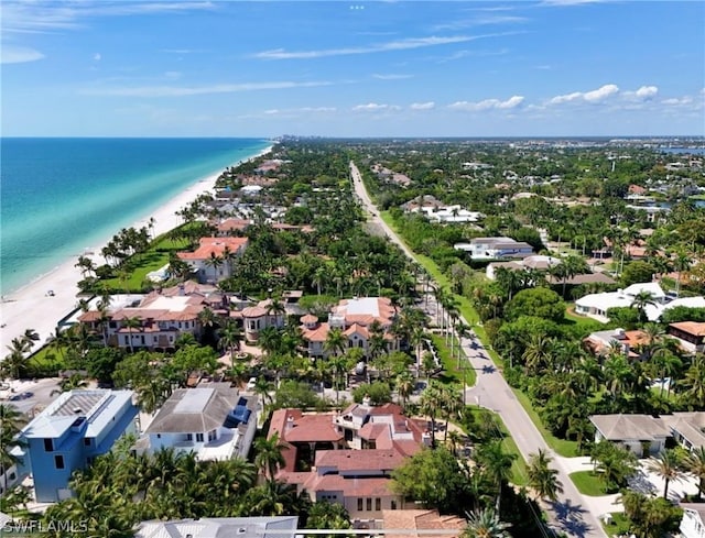 aerial view featuring a water view and a view of the beach