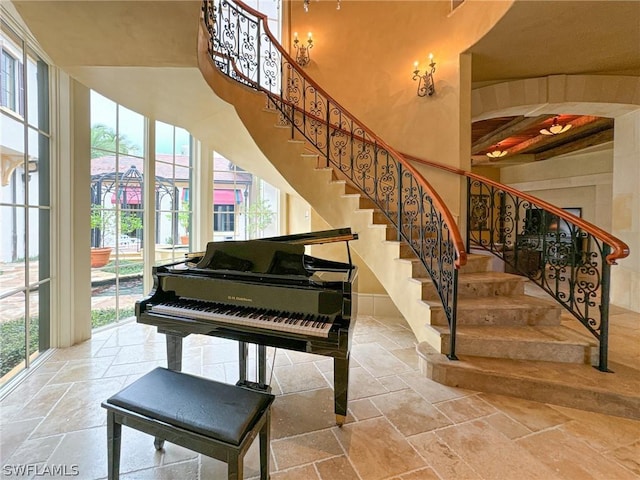 miscellaneous room with a high ceiling