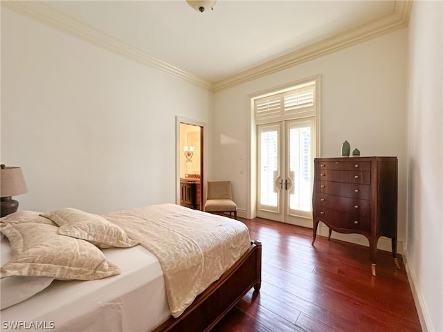 bedroom with crown molding, dark hardwood / wood-style flooring, and ensuite bathroom