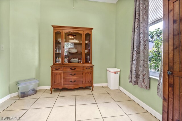 interior space featuring tile patterned flooring and a healthy amount of sunlight