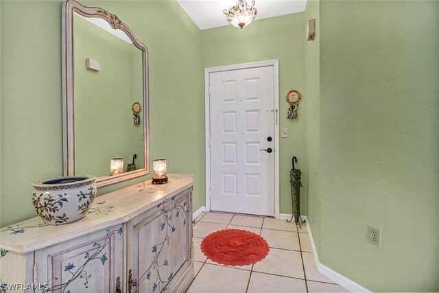 entryway featuring light tile patterned floors