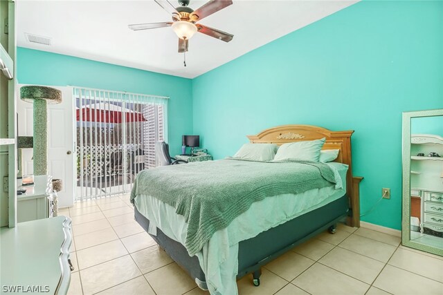 bedroom featuring access to outside, ceiling fan, and light tile patterned floors