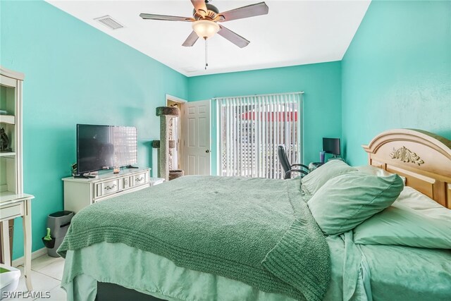 bedroom featuring light tile patterned floors and ceiling fan