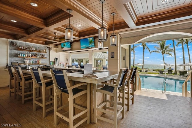 bar with beam ceiling, wood ceiling, coffered ceiling, and wood-type flooring