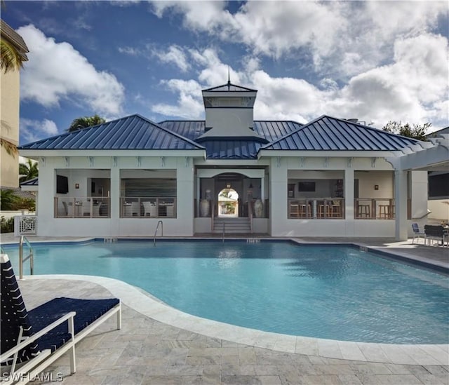 view of pool with a patio area