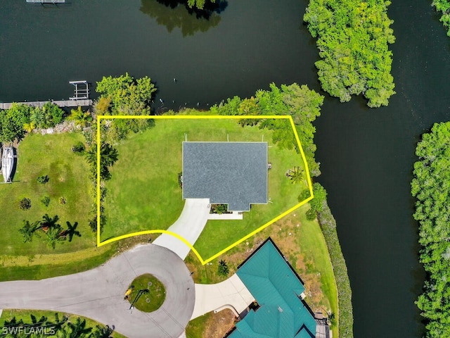 birds eye view of property featuring a water view