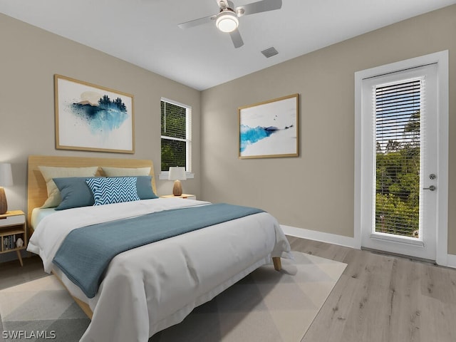 bedroom featuring ceiling fan and light hardwood / wood-style floors