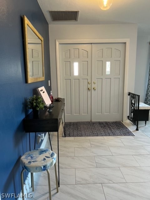 view of tiled foyer