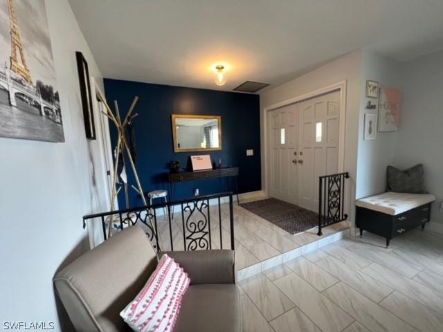 entrance foyer with visible vents and marble finish floor
